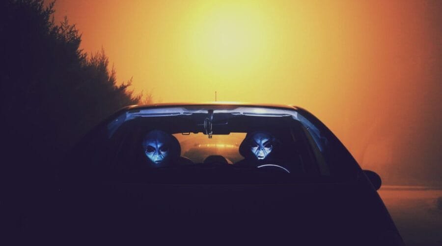 two alien inside car wallpaper