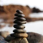 la meditacion balance blur boulder close up